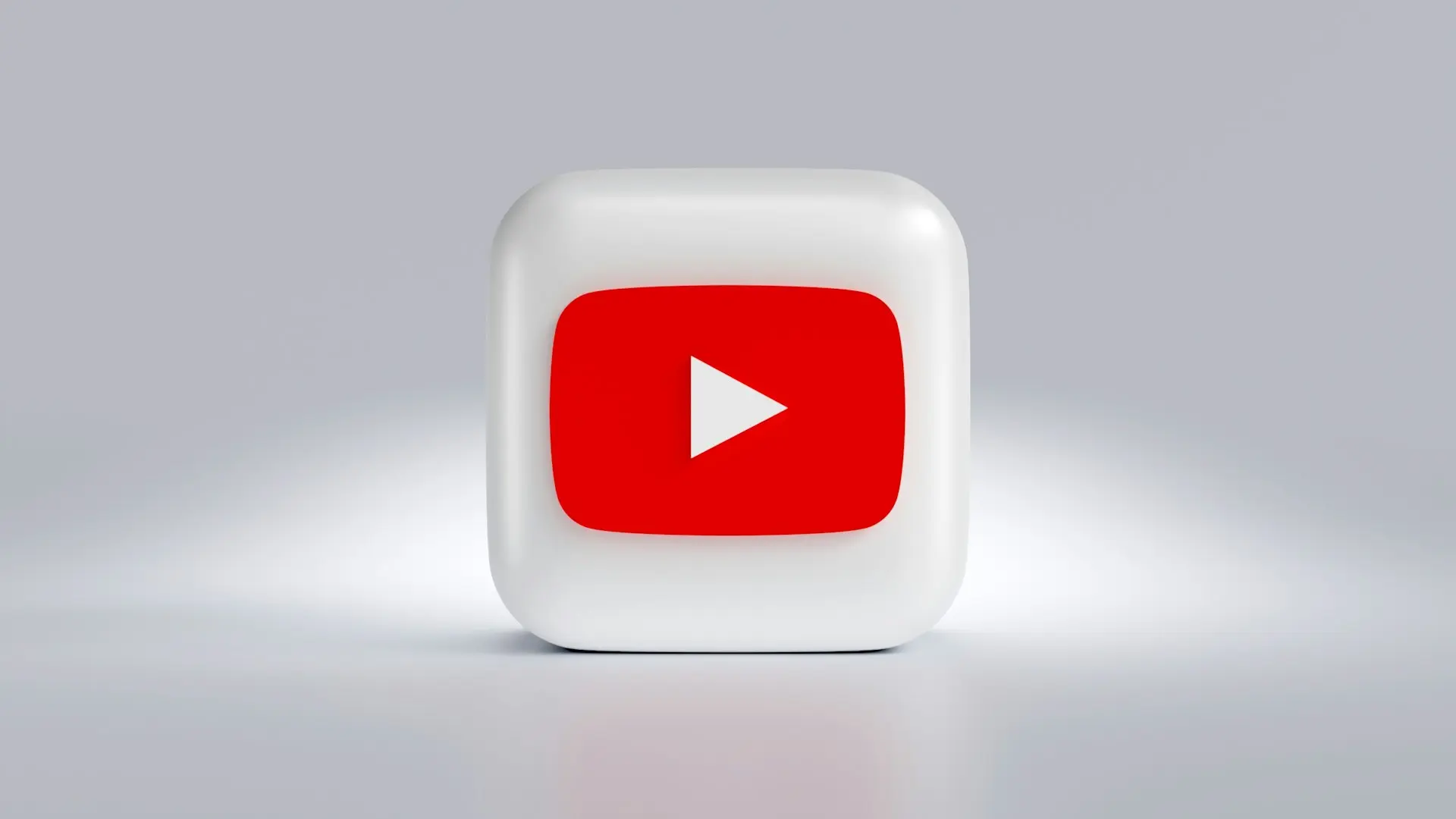 a white square button with a red arrow on it
